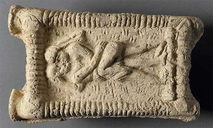 Ancient Mesopotamian clay tablet documenting kissing.