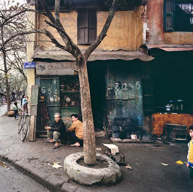 In front of an electrical shop on Hang Dau Street in 1988.