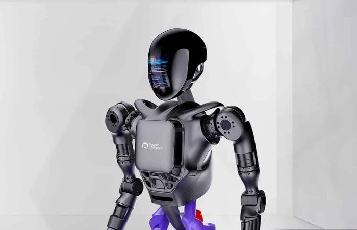 The robot maintains balance while walking and performing various tasks.
