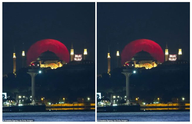 The fiery orange supermoon seen above The Shard - the tallest building in England