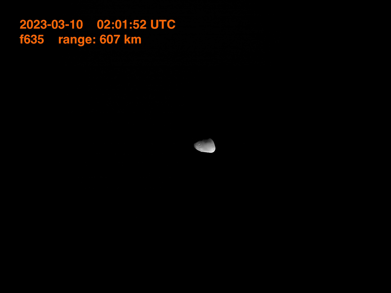 Hope flies past Deimos and captures its unusual shape