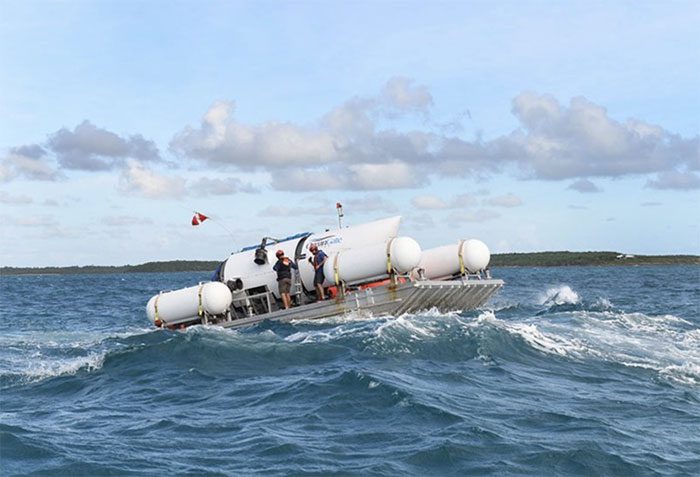 The submarine being brought to the designated drop-off location.