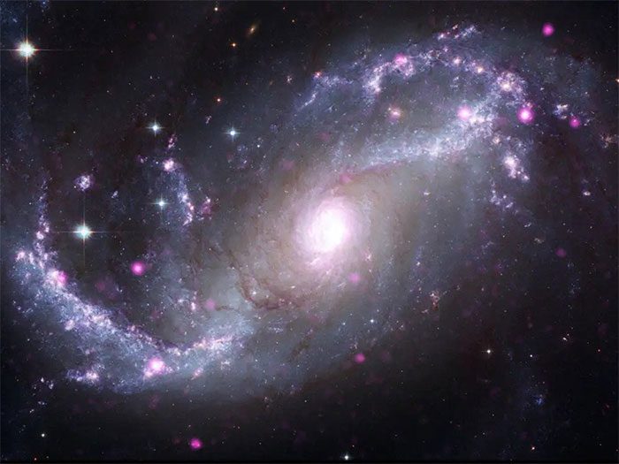 NGC 1672 is a spiral galaxy approximately 60 million light-years from Earth