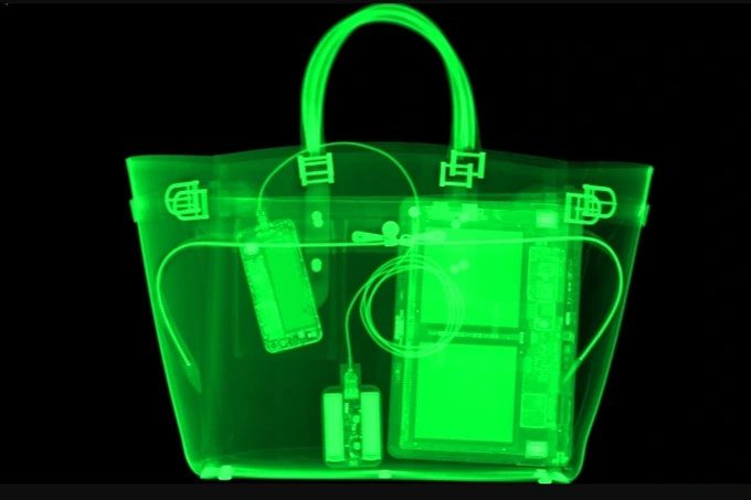 A laptop can effectively shield suspicious items