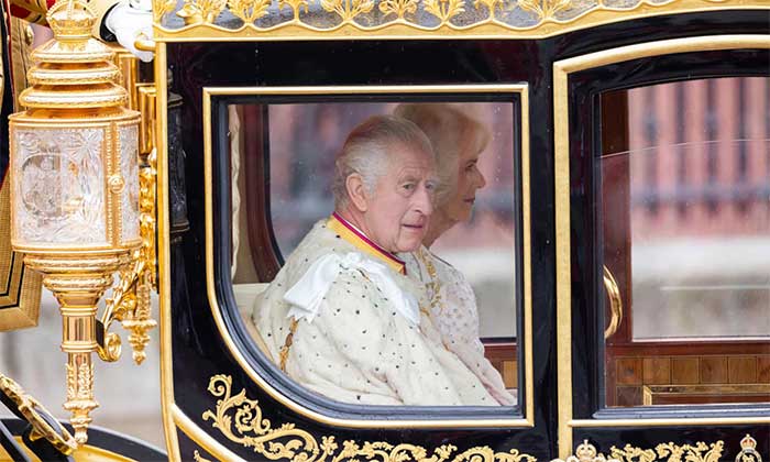 King Charles and Queen Camilla departing Buckingham Palace in the Diamond Jubilee carriage
