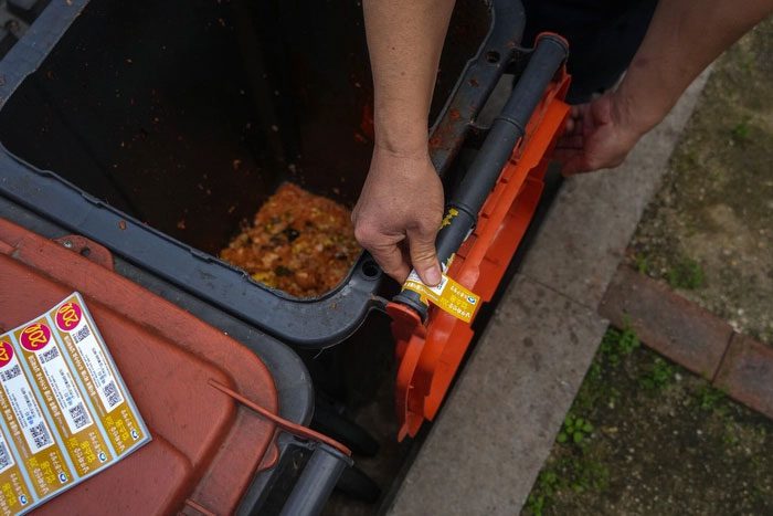 At the end of the day, restaurant leftovers are poured into a special bin
