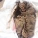 2000 year old body found in landfill 126442
