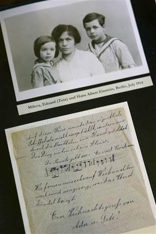 Einstein's first wife with their two sons, and one of the letters from the collection