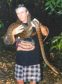 Graeme Gow with snakes