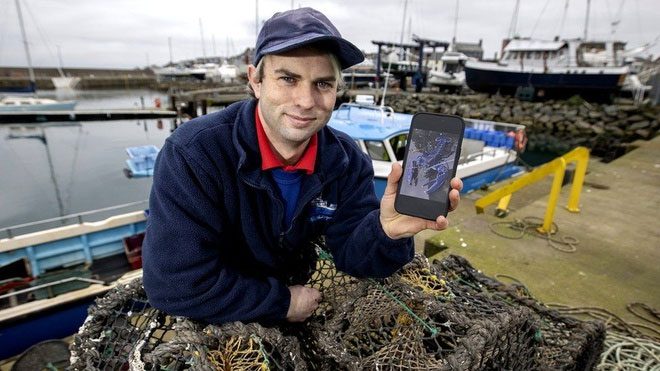 Mr. Stuart Brown, the fisherman who caught the rare lobster.