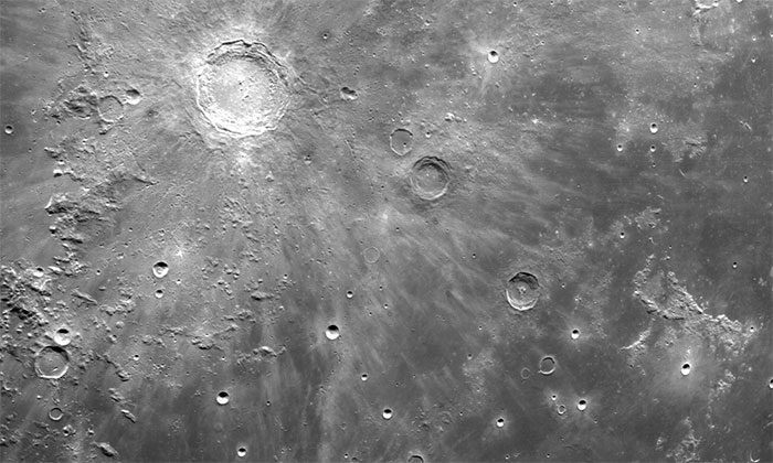 The Orion spacecraft captured close-up images of the Moon's surface.