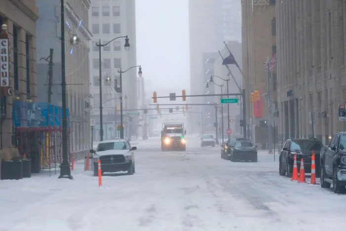 Snowplows in Detroit on December 23.