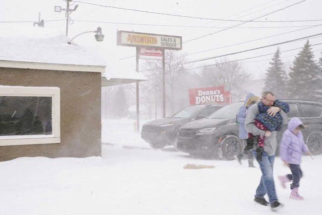 Americans continue to endure freezing weather and heavy snowfall.