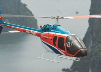 bell 505 helicopter flying over ha long bay what is special 126756
