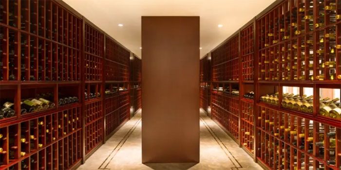 The home's interior is equally magnificent, featuring a stunning wine cellar.