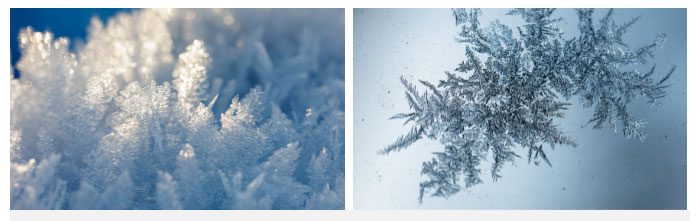 Temperature drops below zero, snowflakes visible on residential windows.