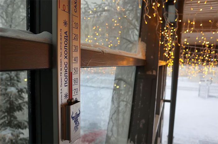 A thermometer showing an air temperature of approximately minus 48 degrees Celsius outside a hotel in downtown Yakutsk.