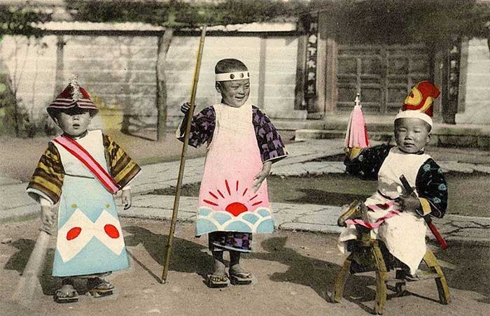 Three boys dressed as samurai captured in the early 1900s