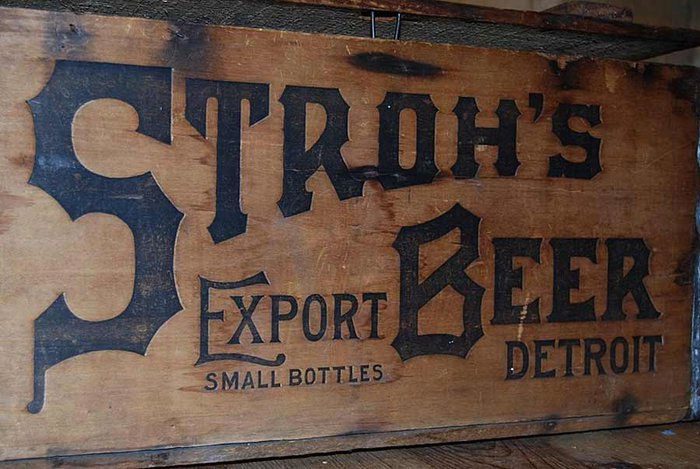 Two workers discovered an old Stroh's Bohemian beer bottle at Michigan Station.
