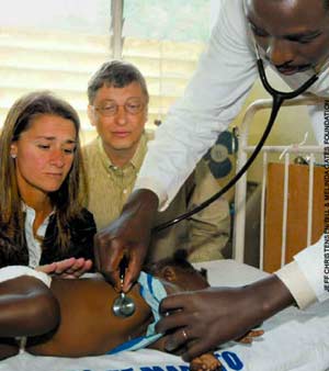 Bill and Melinda Gates observing an HIV treatment for children