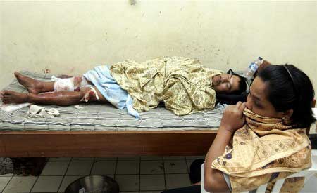 Residents of Pangandaran Beach being rescued