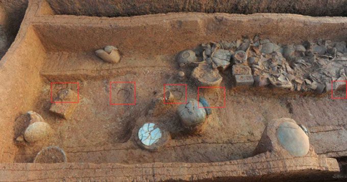 2,000-year-old tomb with remnants of decayed pillars.