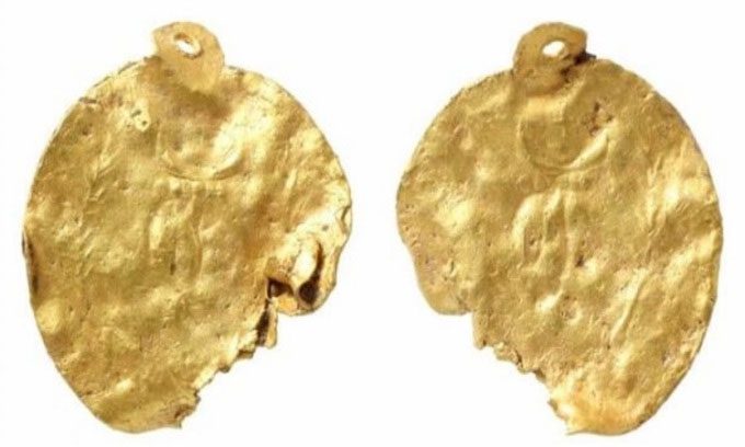 Ancient gold earring excavated from a field in Norfolk.