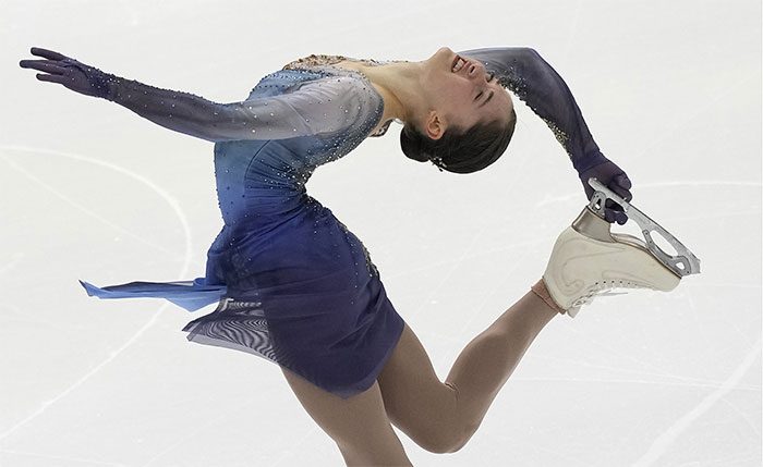 Isabeau Levito performing her routine in a figure skating competition.