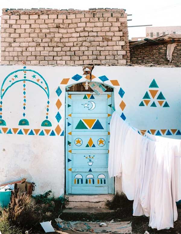 Nubians often paint characteristic symbols of Nubian culture on their house walls.