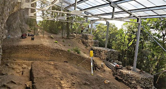 Archaeological excavation at the entrance of the Grotte Mandrin cave in southern France.