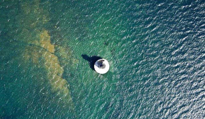 Here, land is not in sight, only the cries of seagulls.