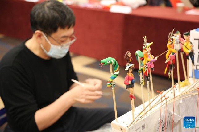 An artisan participates in a cultural and folk art festival in Flushing (New York, USA) for the Lunar New Year.