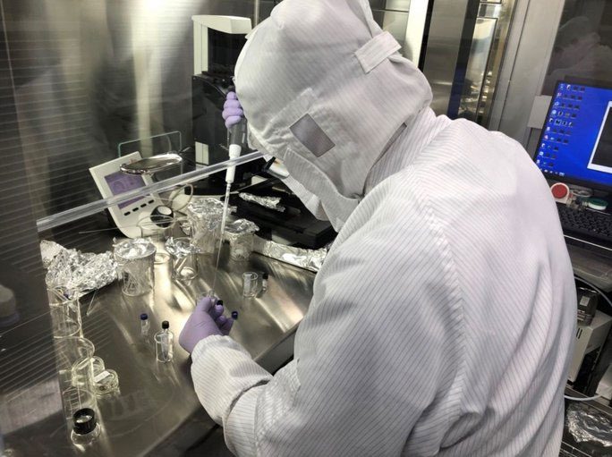 A Japanese scientist analyzing samples from the "Dragon Palace"