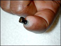 Metal rod passing through skin