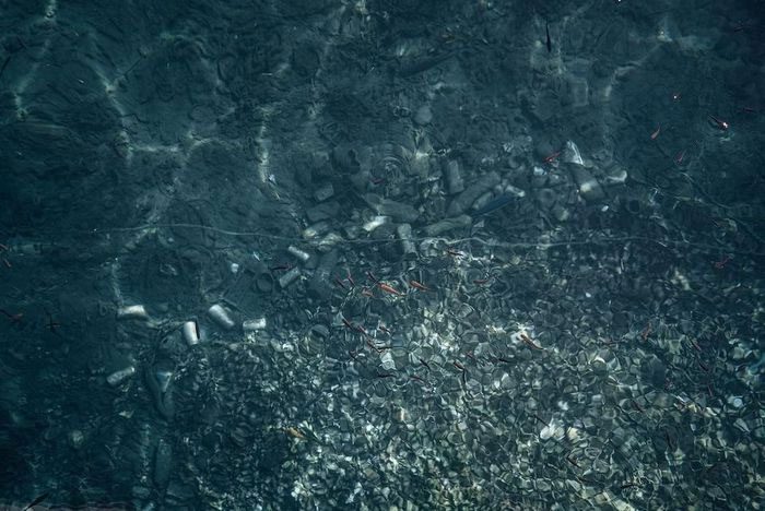 Plastic waste in the sea off the coast of Kithnos, Greece in July 2022.