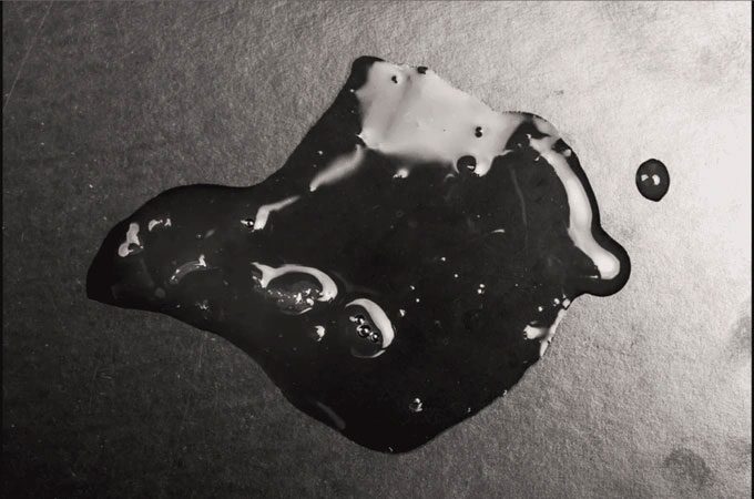 The robot will transition from a solid to a liquid state when it receives a self-destruct command.
