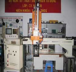 Vertical PET plastic preform manipulator.