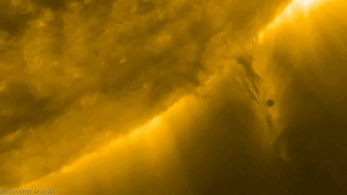 The black dot moving in this video is Mercury crossing the Sun on January 3, 2023