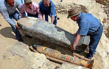 Egyptian archaeologists opening an ancient sarcophagus