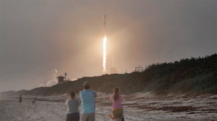 SpaceX Falcon 9 rocket carrying 60 Starlink satellites into space