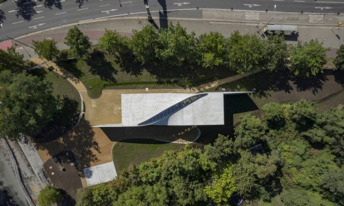 The diagonal cut forms the skylight of the building.