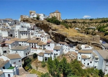 there is a place in europe where people really live below a huge stone 126350