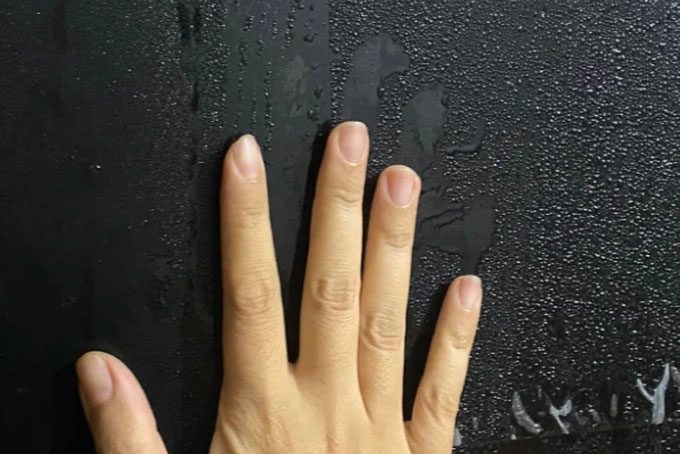 Humid weather causes water to condense into droplets on walls, refrigerators...