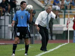 A player from the Uruguay team is preparing for a throw-in