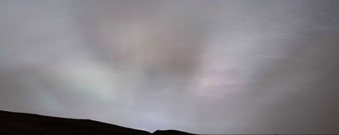 Sunlight rays shining through clouds
