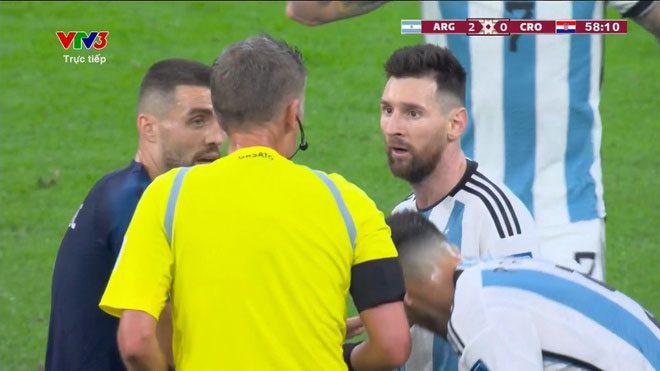 Referee pauses the game to replace the ball in the Argentina vs. Croatia match.