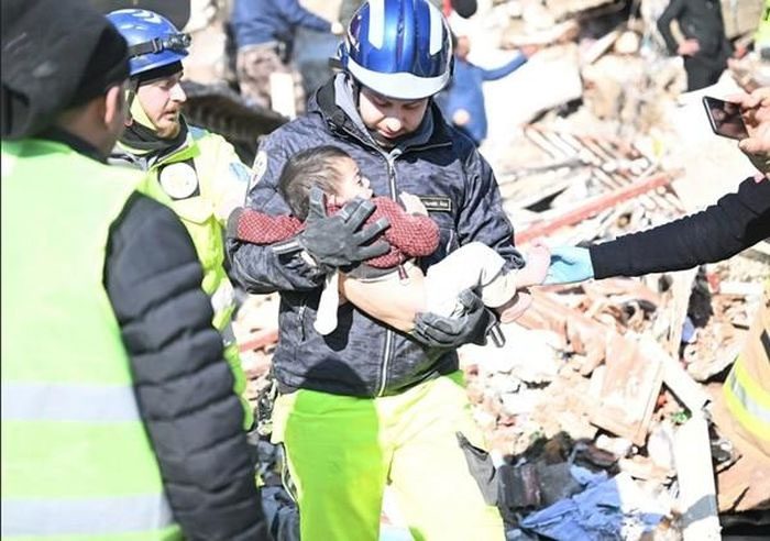 A child rescued from a collapsed building more than 9 days after the earthquake.