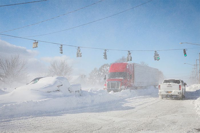 Roads in Buffalo, Erie County, are still filled with cars, buses, ambulances, tow trucks...