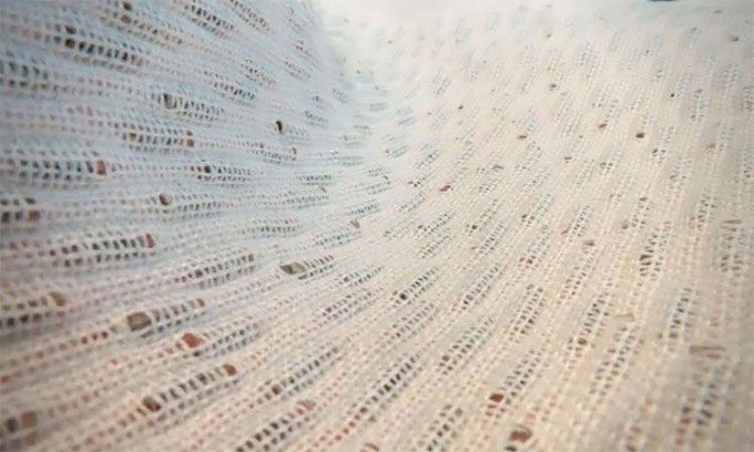 Solar-integrated fabric can charge electronic devices.