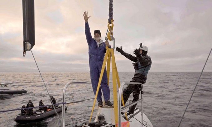 Victor Vescovo (left) has descended to the deepest ocean trench.